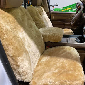 Our Ready-Fit Sheepskin Seat Covers are made to fit standard bucket seats. You get the comfort of plush natural sheepskin without the high cost of a tailored seat cover. Each cover is made with genuine merino sheepskin wool. Not only do you get roughly an inch of padded comfort, but natural fibers allow air to properly circulate keeping your seats the perfect temperature season-to-season.