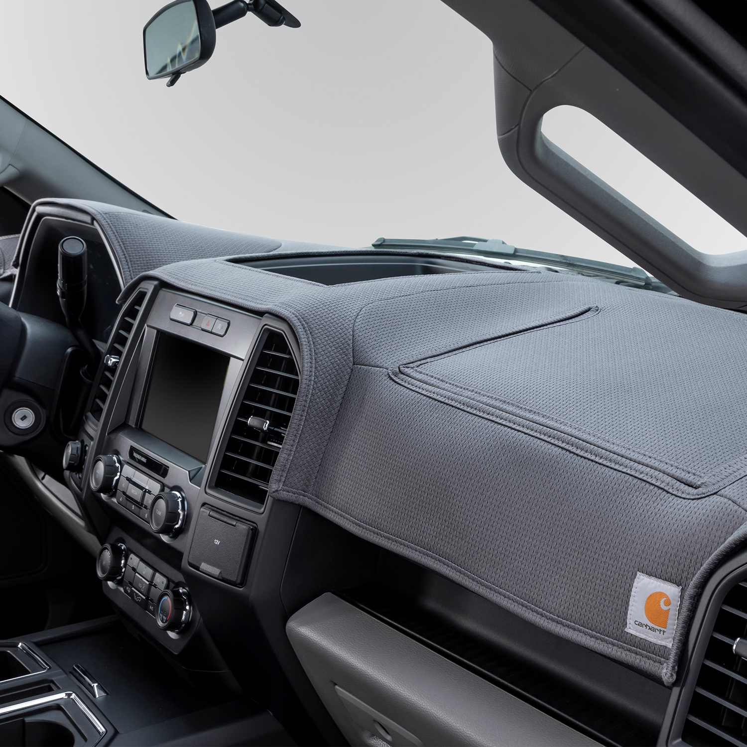 Are you ready to give your dash the rugged protection and style it needs? You cannot go wrong with our exclusive Carhartt LTD DashMat. These custom dash covers are designed to fit your specific dashboard to ensure you have maximum protection. Features a unique warp-knit design similar to your classic workwear for a rugged and sleek look. ashMat you are getting the ultimate protection to keep your speakers from cracking.</i></p>        <p>Transform the look of your truck today while giving your vehicle the protection it needs. Perfect for work trucks to keep dust and grime off your dash while adding a rugged look to command attention.</p>